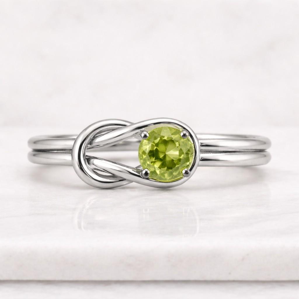 solid gold round cut peridot engagement ring, halo ring