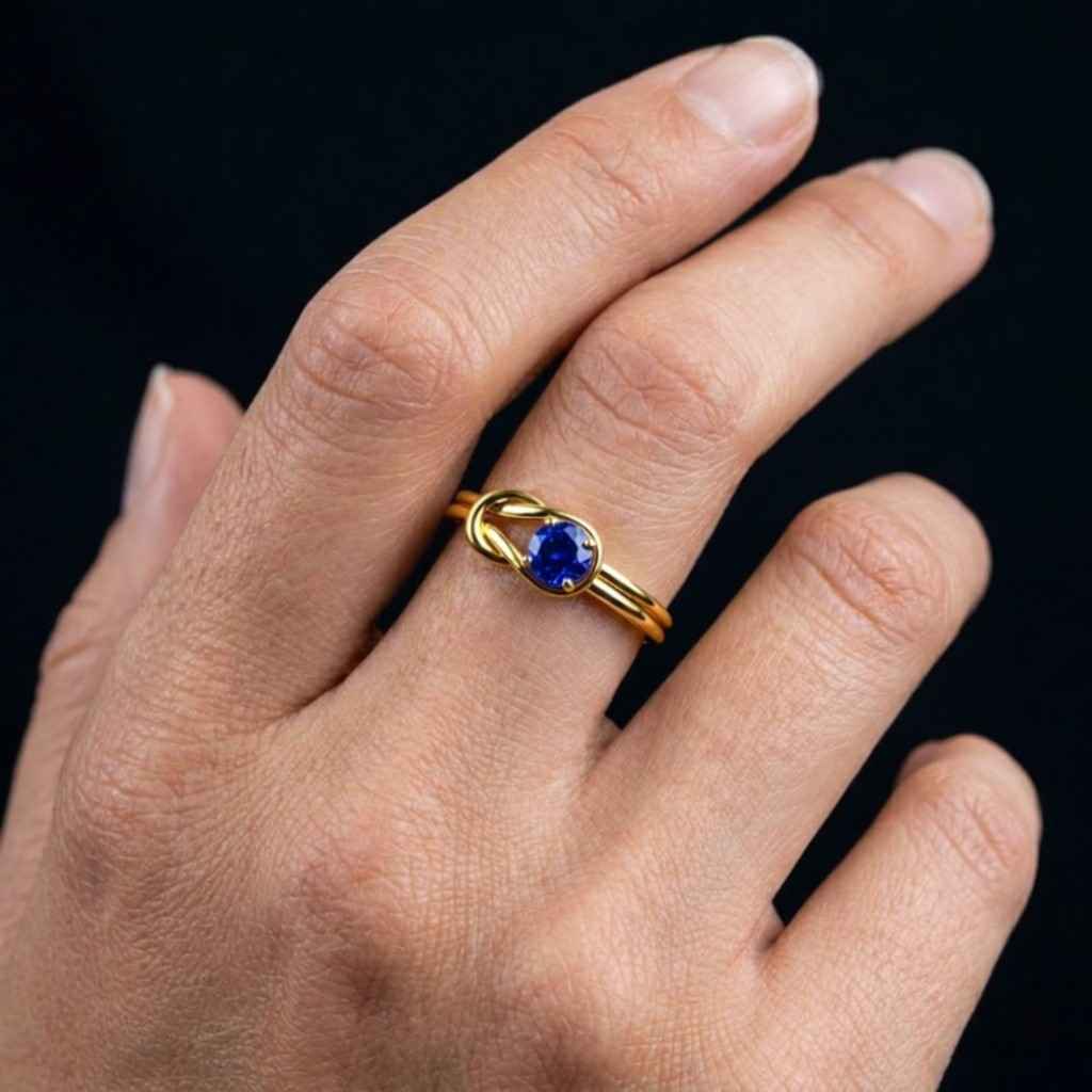 Dainty Blue Sapphire Ring: 14k Yellow Gold Crossover Design
