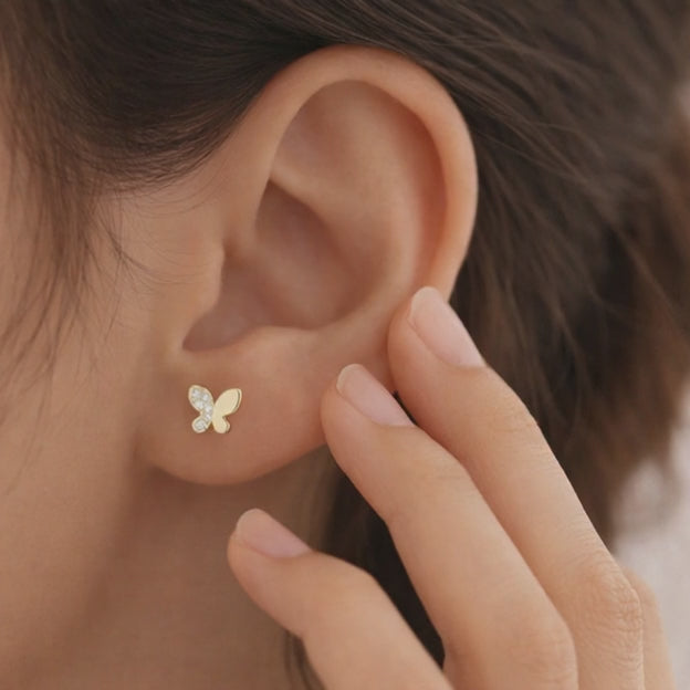 luxury butterfly stud earrings gold with lab diamonds fine jewelry close detail small diamond earrings for women minimalist style gold stud earrings