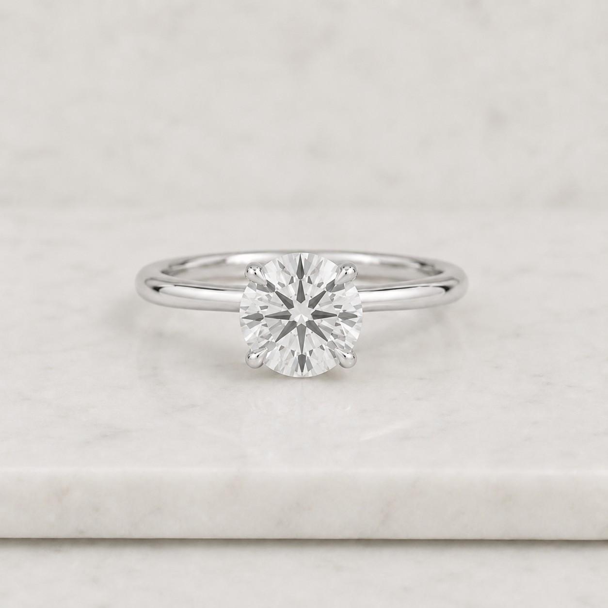14k gold round cut moissanite solitaire engagement ring - igi certified