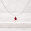 Pear Cut Ruby Gemstone Pendant Necklace in White Gold