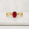 Oval Cut Ruby Gemstone and Diamond Twist Ring