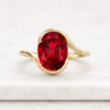 Oval Cut Ruby Birthstone Solitaire Ring in 14K Yellow Gold
