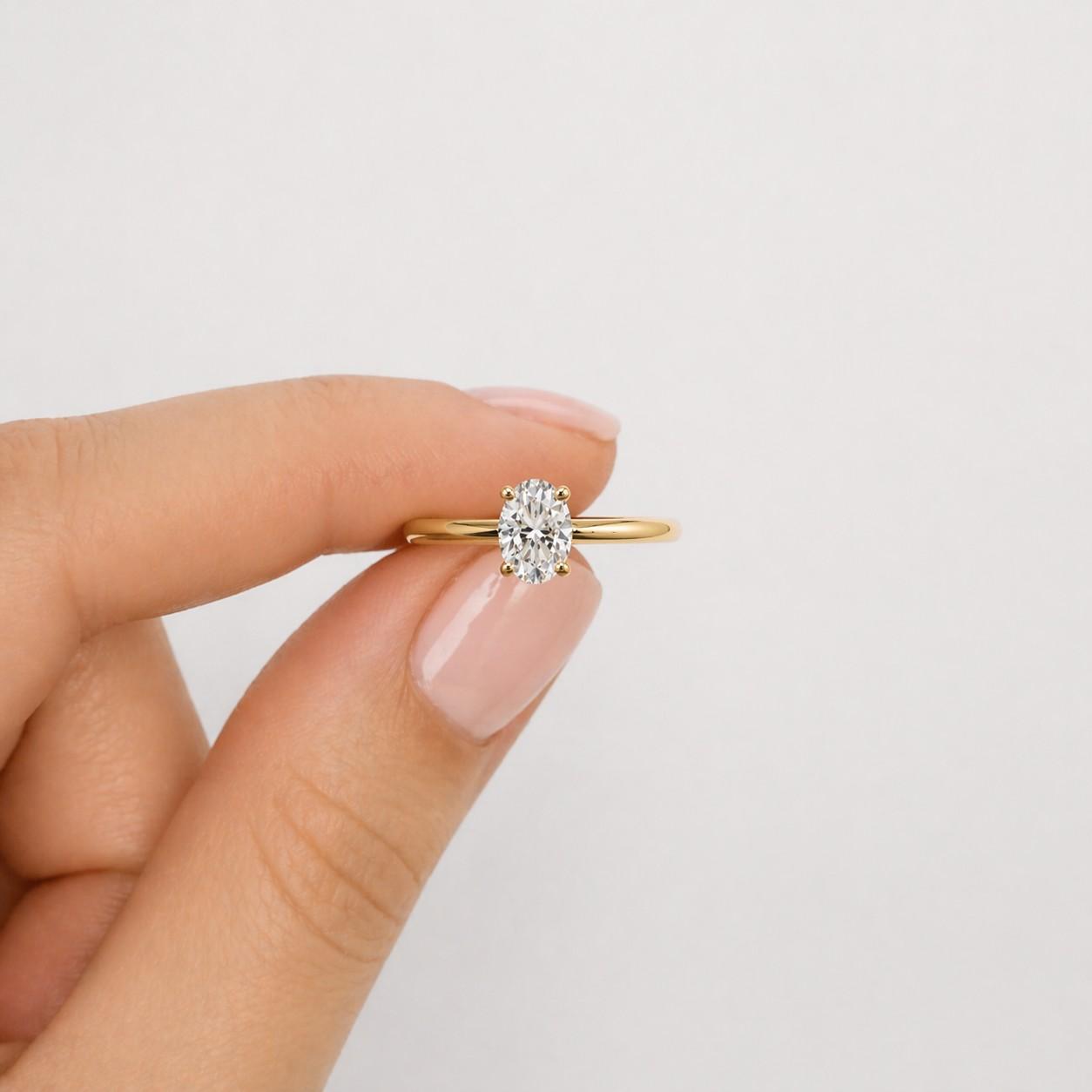 2 carat oval lab grown diamond solitaire engagement ring | 14k yellow gold | igi certified