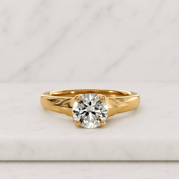 Solitaire Round-Cut Diamond Engagement Ring with a Polished Yellow Gold Band
