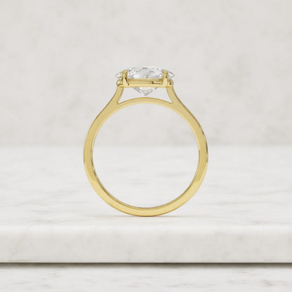 Engagement ring with an oval-cut solitaire in an east-west setting, diamond, gold, handmade, vintage luxury
