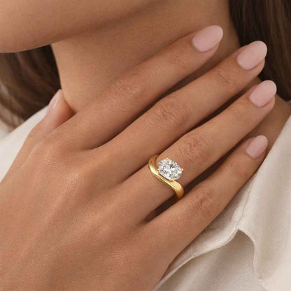 statement jewelry yellow metal ring smooth finish ring glossy ring curved ring flowing design ring artistic ring luxury accessory bridal