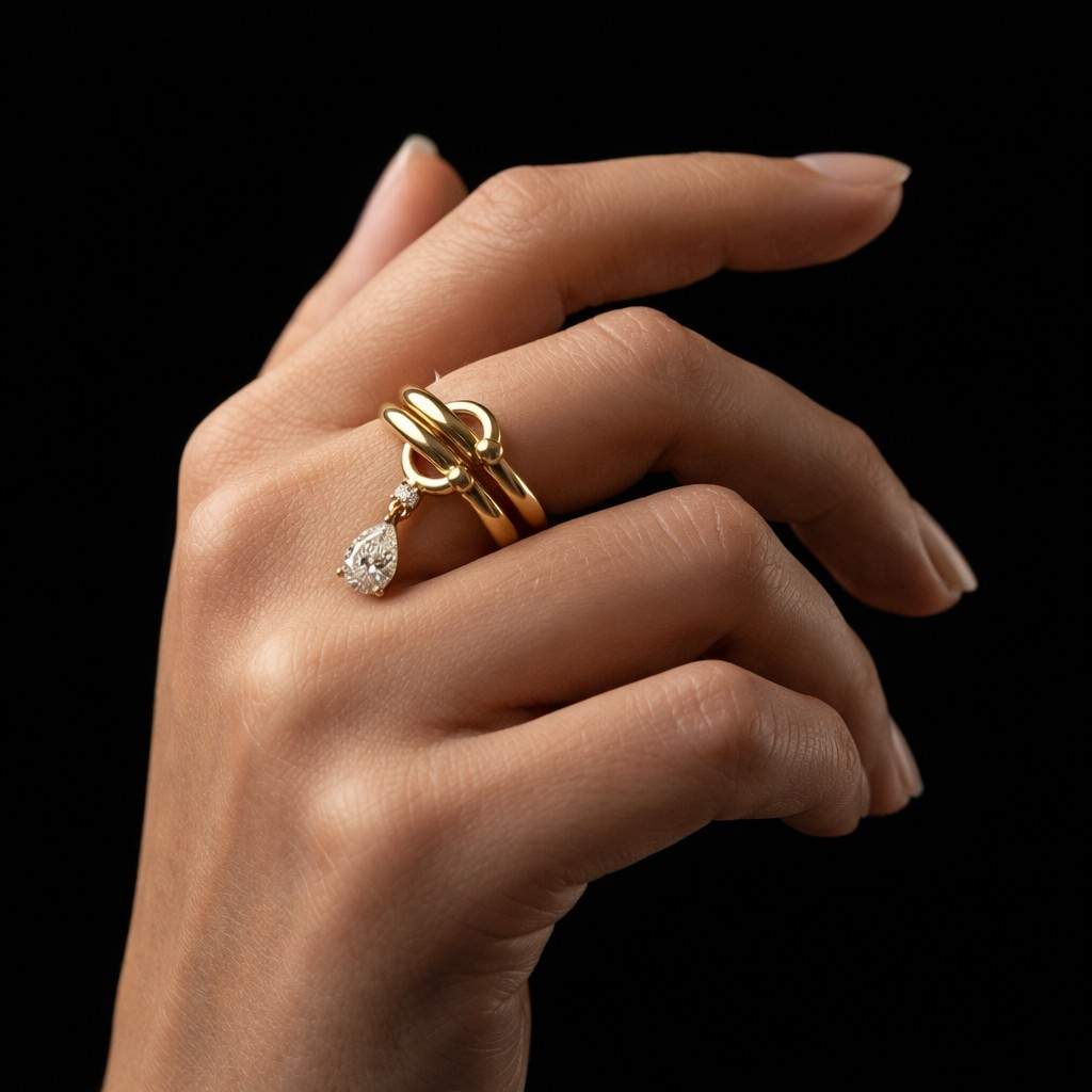 pear diamond dangle ring | modern gold knot band | minimalist statement bridal jewelry