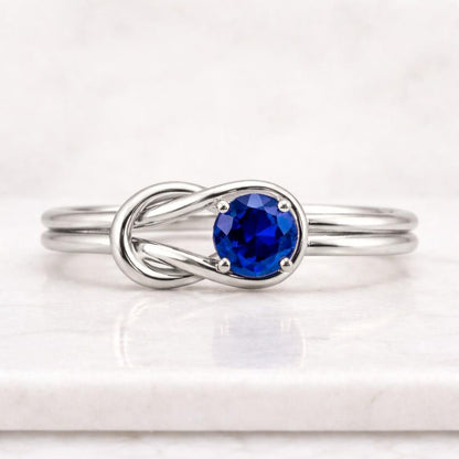 Blue Sapphire Infinity Knot Ring: 925 Sterling Silver, 5mm Gemstone
