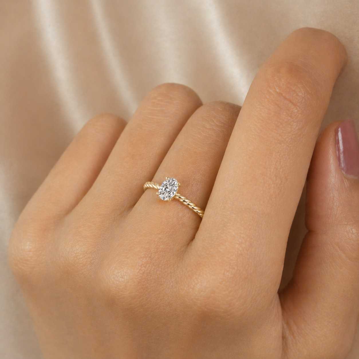 oval moissanite engagement ring: twisted rope band, tulip prongs, rose gold bridal promise ring